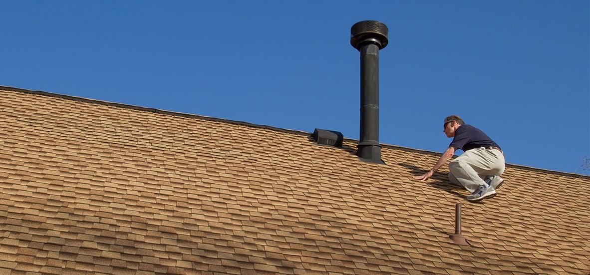 Roofing Contractor in Prince George is Doing Shingles roof maintenance